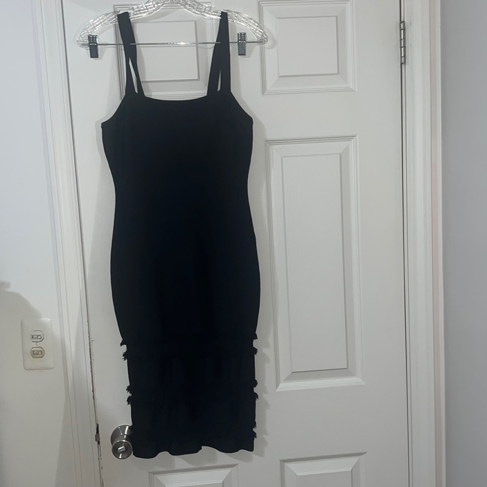 Black knee length dress with detail